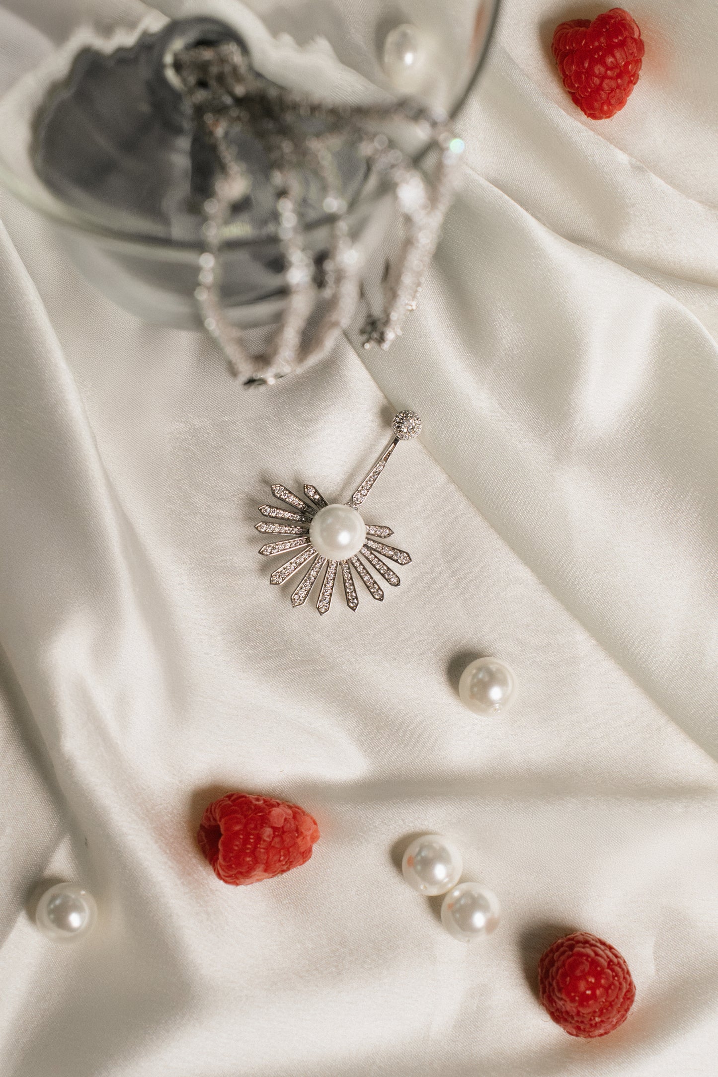 Sunburst pearl brooch